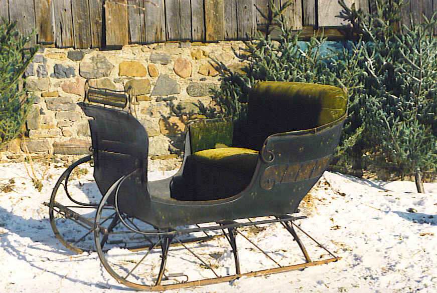 tip top sleigh with green seat